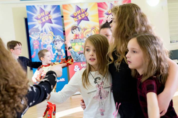 Children playing Awesome Atoms