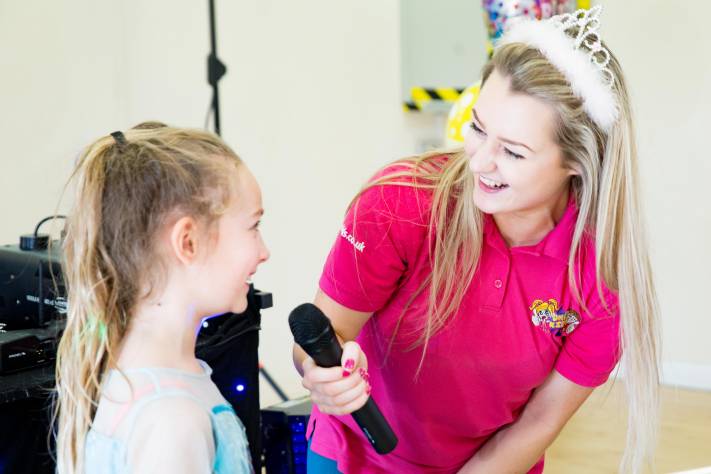 Children's entertainer with microphone