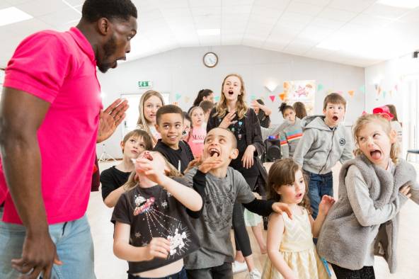 Entertainer leading musical chairs